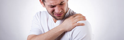 Man with shoulder injury suffering from pain