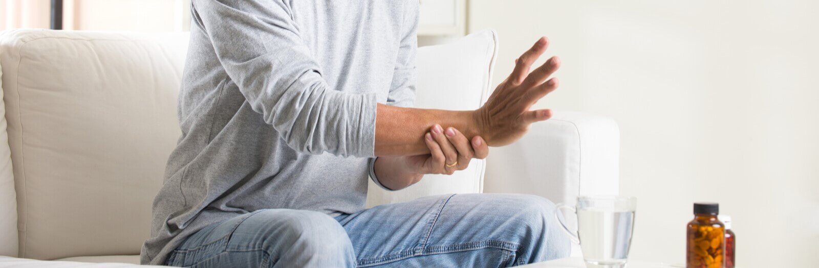 Man holding his wrist suffering from carpal tunnel syndrome