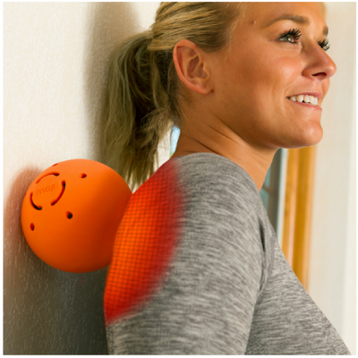 Moji Heated Large Massage Ball product in use - female rolling back